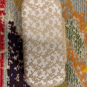 Chic Gold and White Clutch with Intricate Lace Design